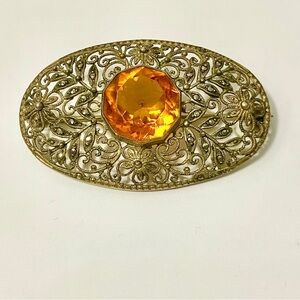 Antique open work brooch with set with marcasite stones and glass